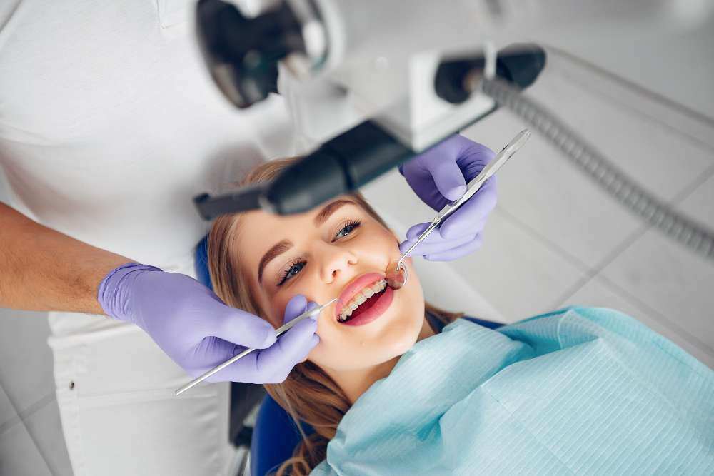 beautiful-girl-sitting-dentist-s-office